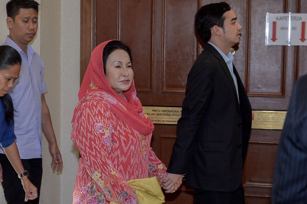 Datin Seri Rosmah Mansor arrives at the Kuala Lumpur High Court with son Norashman Najib December 6, 2018. u00e2u20acu201d Picture by Hari Anggara