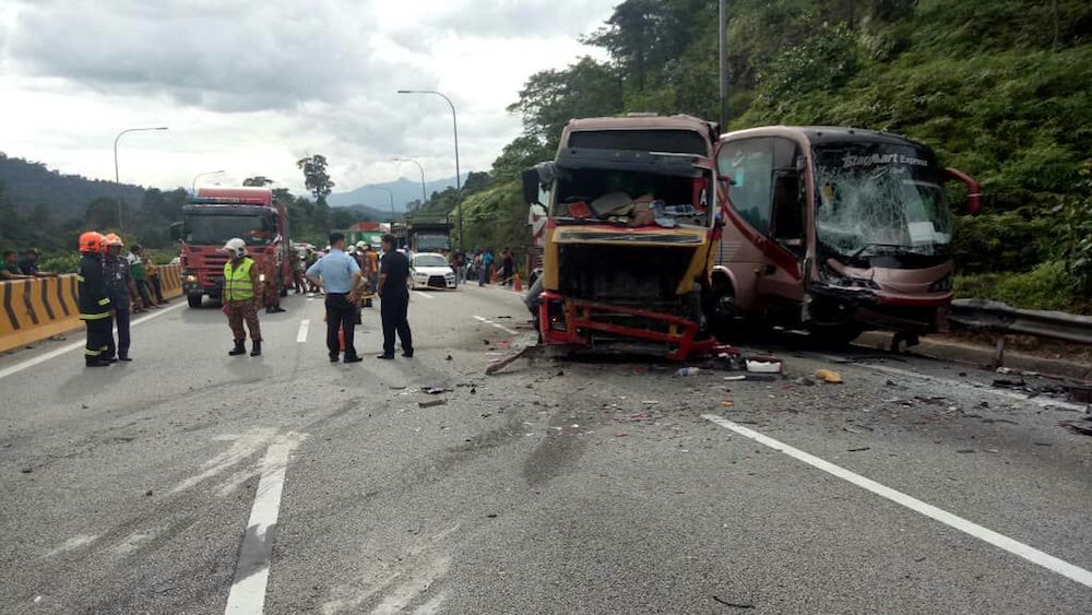The aftermath of the accident at KM257 northbound of the North-South Expressway towards Kuala Kangsar on December 13, 2018. u00e2u20acu201d Picture courtesy of the Fire and Rescue Department