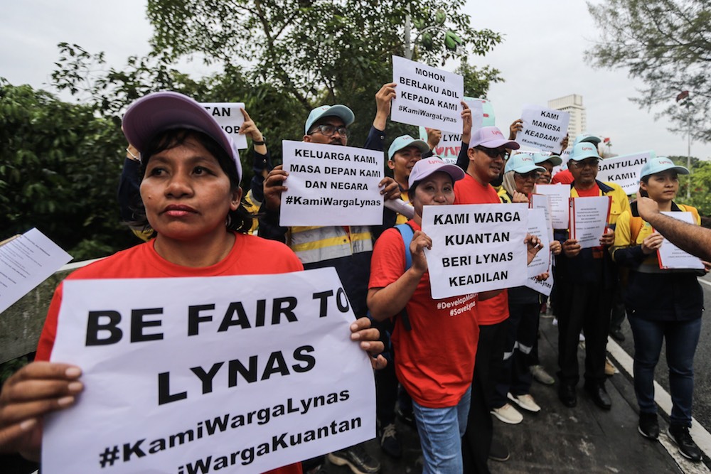 Lynas employees demonstrate in front of the Parliament compound in Kuala Lumpur December 11, 2018. u00e2u20acu201d Picture by Hari Anggara