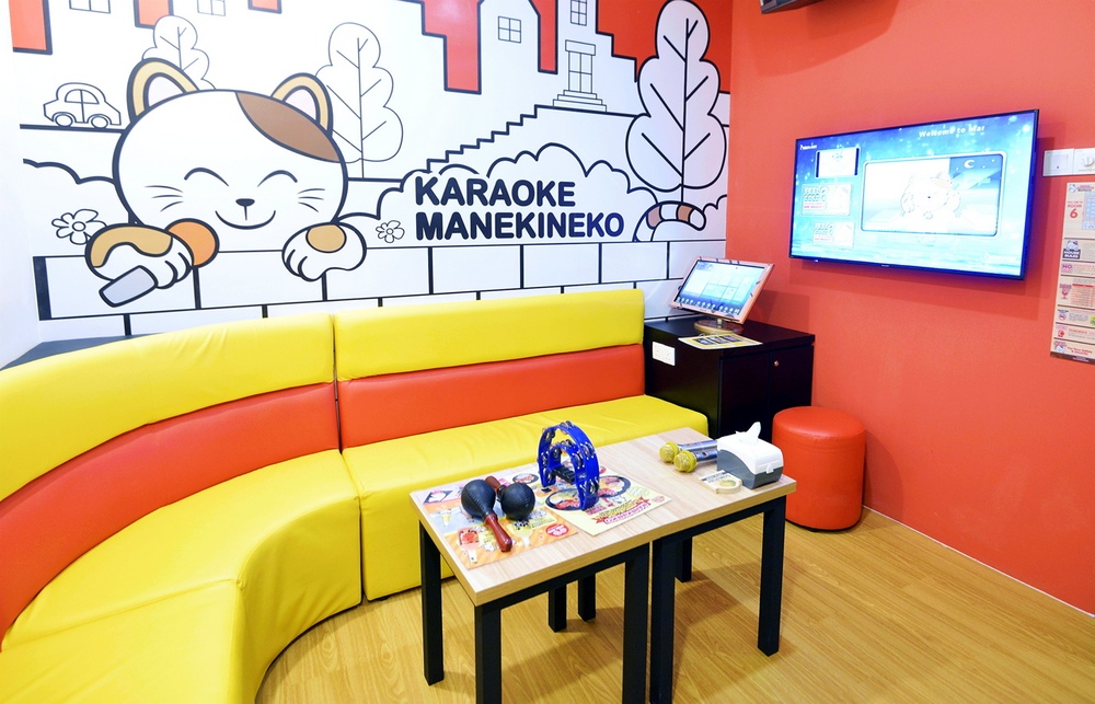 The 'beckoning cat' is featured throughout the venue and adds to the colour and atmosphere of the karaoke rooms. 