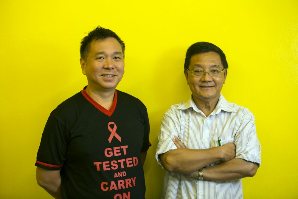 Hisham (right) and Tai work tirelessly at the PT Foundation to fight for the rights of people living with HIV. u00e2u20acu201d Picture by Ahmad Yusni