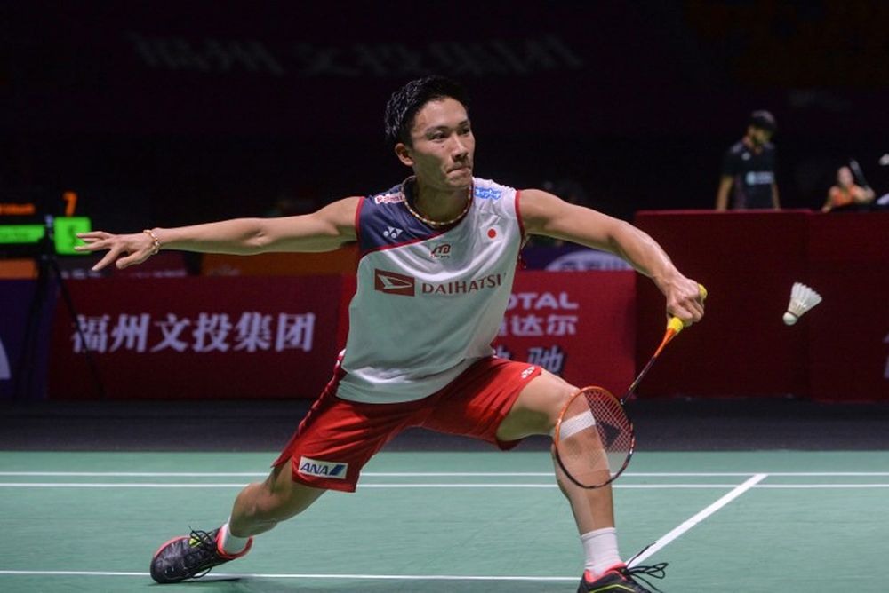 Kento Momota of Japan hits a return against Son Wan-ho of South Korea during their menu00e2u20acu2122s singles quarter-final match at the China Open 2018 in Fuzhou, November 9, 2018. u00e2u20acu201d AFP pic