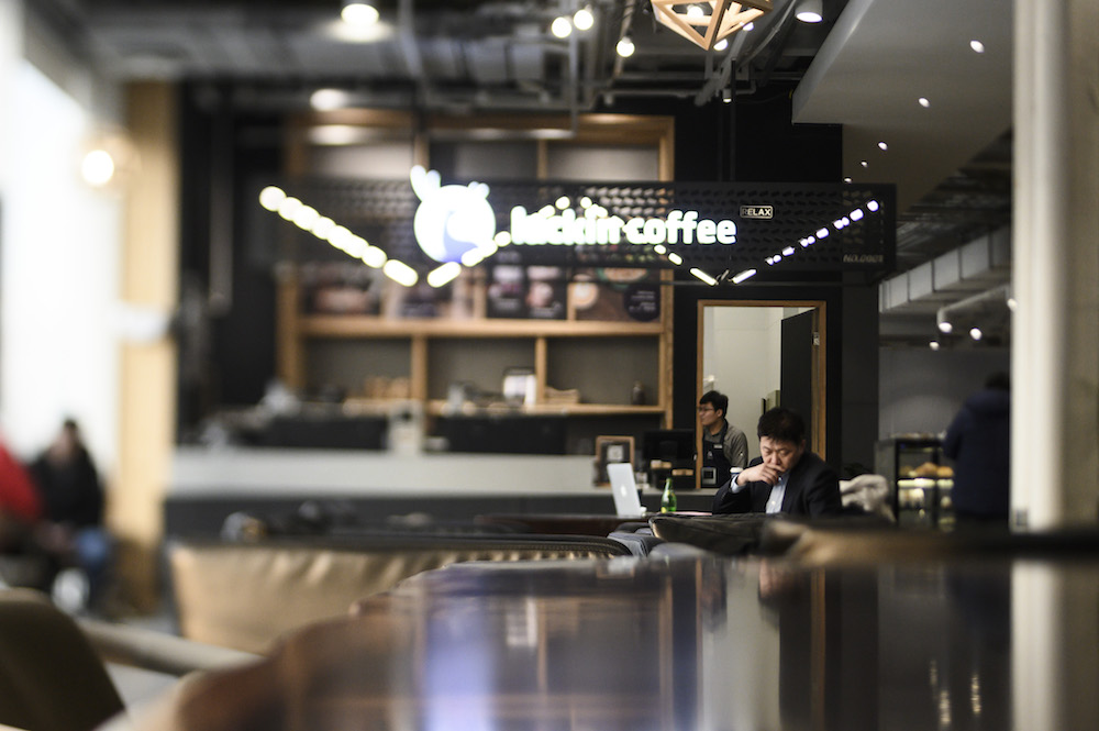 A customer waits at a Luckin Coffee in Beijing January 14, 2019. u00e2u20acu201d AFP pic
