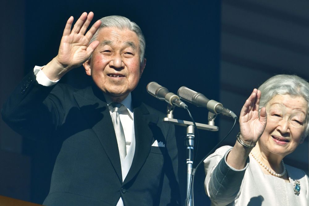 Japanu00e2u20acu2122s Emperor Akihito and Empress Michiko wave to well-wishers from the balcony of the Imperial Palace in Tokyo January 2, 2019. u00e2u20acu201d AFP pic