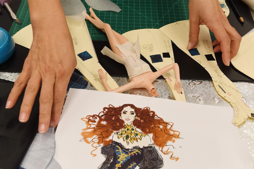 Stylist Carlyle Nuera works on fashion for Barbie doll prototypes at a workshop in the Mattel design centre as the iconic doll turns 60, in El Segundo December 7, 2018. — AFP pic