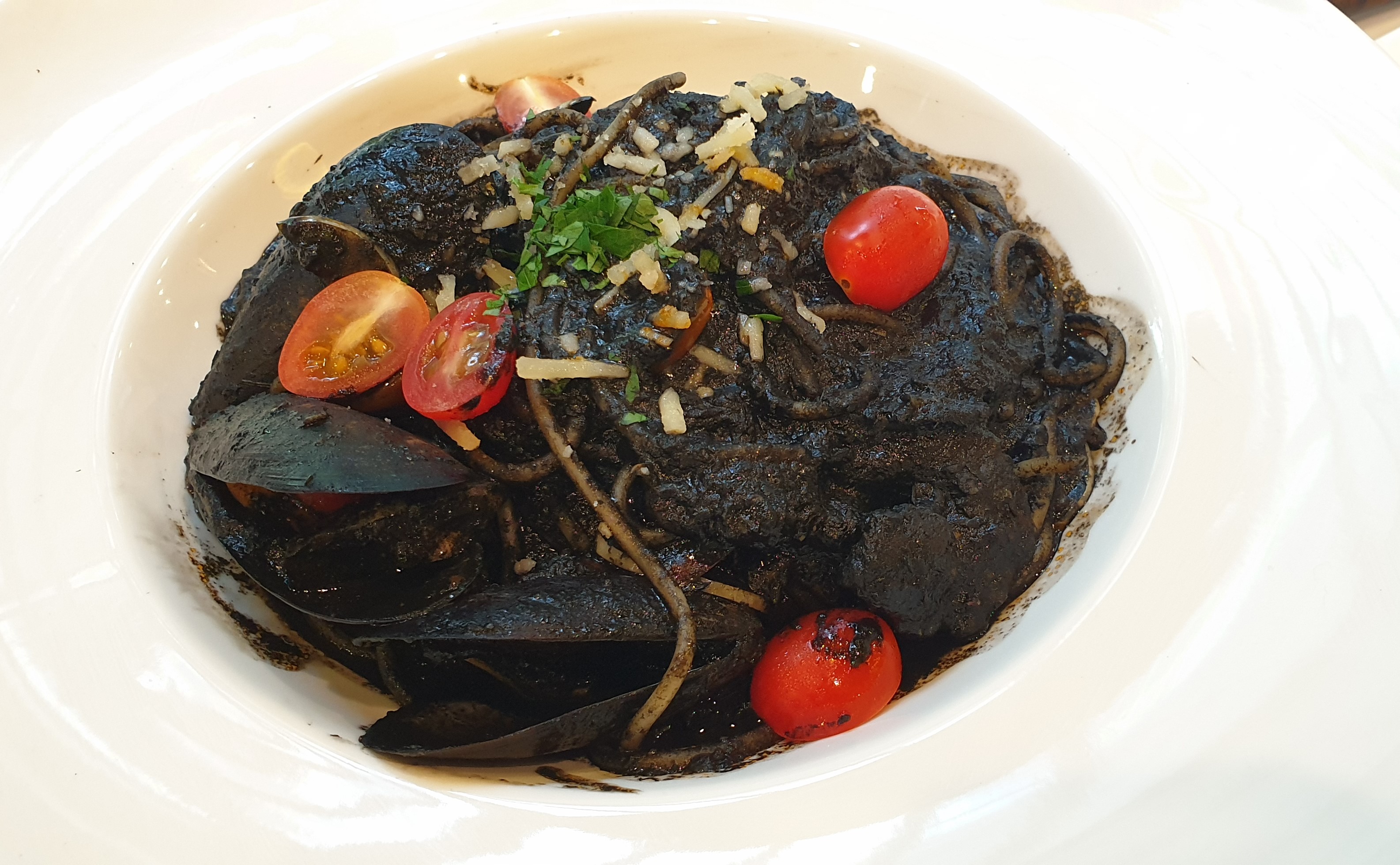 Squid Ink Spaghetti here is spicy and a treat for seafood lovers.