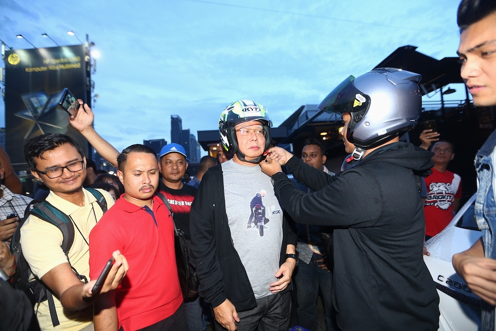 Datuk Seri Najib Razak mingles with motorcycle enthusiasts at the Podium in Kuala Lumpur January 20, 2019. u00e2u20acu201d Picture by Ahmad Zamzahuri