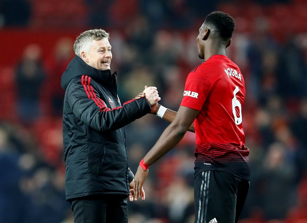 Manchester United's Paul Pogba and manager Ole Gunnar Solskjaer shake hands after the Premier League match against Huddersfield Town at Old Trafford in Manchester December 26, 2018. u00e2u20acu201d Action Images pic via Reuters