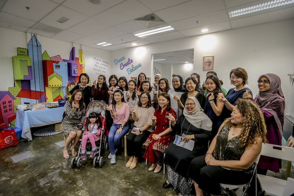 Deputy Women, Family and Community Development Minister Hannah Yeoh poses for photos during launch of HelloHERA at Q Sentral in Kuala Lumpur January 17, 2019. u00e2u20acu201d Picture by Firdaus Latif