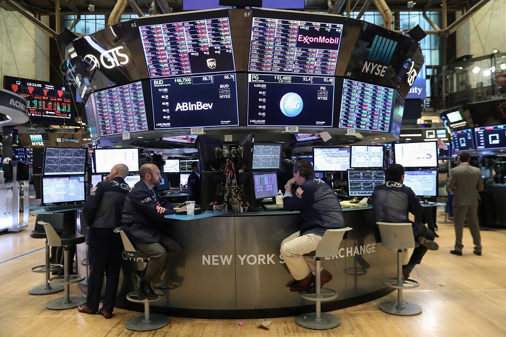 Traders look at price monitors as they work on the floor at the New York Stock Exchange in New York  January 3, 2019. u00e2u20acu201d Reuters pic 