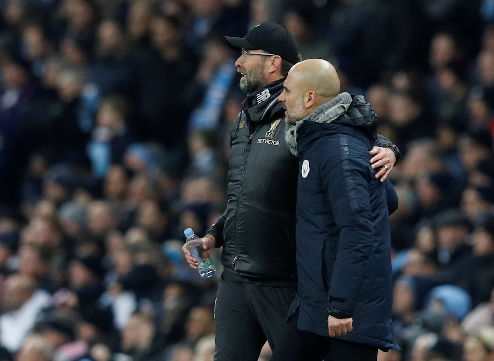 Manchester City manager Pep Guardiola and Liverpool manager Juergen Klopp talk to each other during their Premier League match at the Etihad Stadium in Manchester January 3, 2019. u00e2u20acu201d Reuters pic