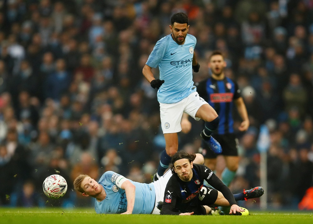 Rotherham Unitedu00e2u20acu2122s Ryan Williams in action with Manchester Cityu00e2u20acu2122s Kevin De Bruyne and Riyad Mahrez at the Etihad Stadium in Manchester January 9, 2019. u00e2u20acu201d Picture by Action Images via Reuters 