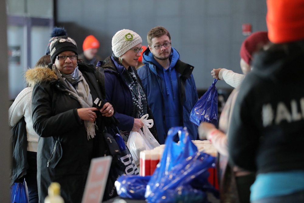 Government employees receive donations at a food distribution center for federal workers impacted by the government shutdown, at the Barclays Centre in the Brooklyn borough of New York January 22, 2019. u00e2u20acu201d Reuters pic