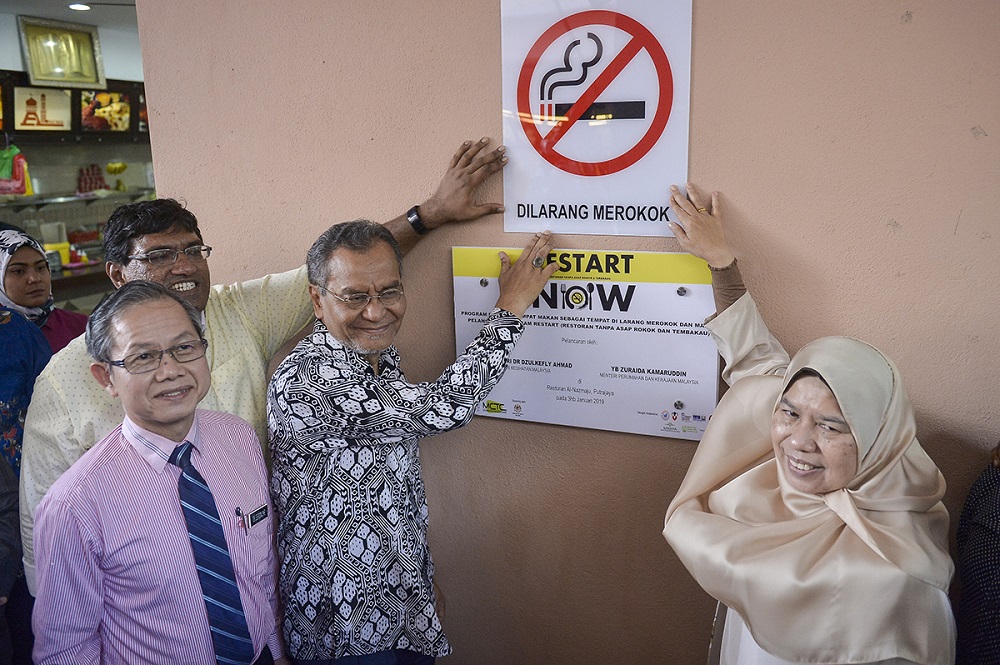 File photo showing Health Minister Datuk Seri Dzulkefly Ahmad (third left) and Housing and Local Government Minister Zuraida Kamaruddin (right) during the launch of an anti-smoking campaign in Putrajaya January 3, 2019. — Picture by Mukhriz Hazim