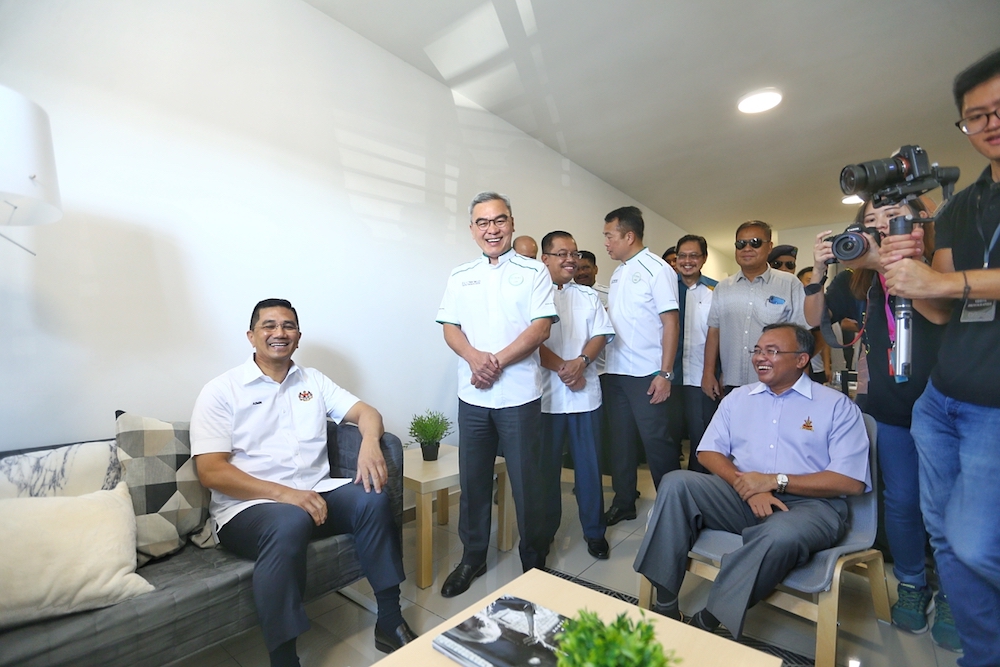 Economic Affairs Minister Datuk Seri Azmin Ali visits a show unit accompanied by chairman of EcoWorld, Tan Sri Liew Kee Sin, in Semenyih January 6, 2019. — Picture by Ahmad Zamzahuri