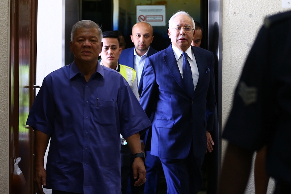 Datuk Seri Najib Razak arrives at the Kuala Lumpur High Court January 7, 2019. u00e2u20acu201d Picture by Ahmad Zamzahuri