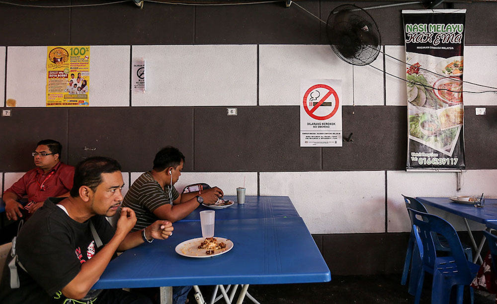 A no-smoking sign is seen at a restaurant in George Town January 7, 2019. u00e2u20acu201d Picture by Sayuti Zainudin