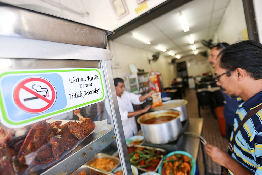 A no-smoking sign is seen at a restaurant in George Town January 7, 2019. u00e2u20acu201d Picture by Sayuti Zainudin