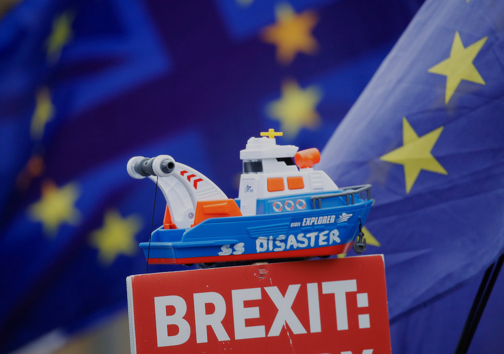 A toy boat named u00e2u20acu02dcSS Disasteru00e2u20acu2122 is seen on top of an anti-brexit demonstrators placard during a protest in London January 7,2019. u00e2u20acu201d Reuters pic