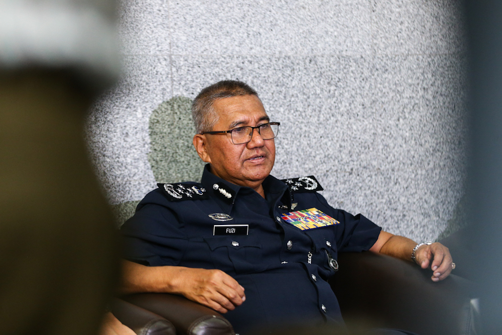 Tan Sri Mohamad Fuzi Harun speaks to reporters after the monthly assembly at Bukit Aman in Kuala Lumpur January 16, 2019. u00e2u20acu201d Picture by Ahmad Zamzahuri