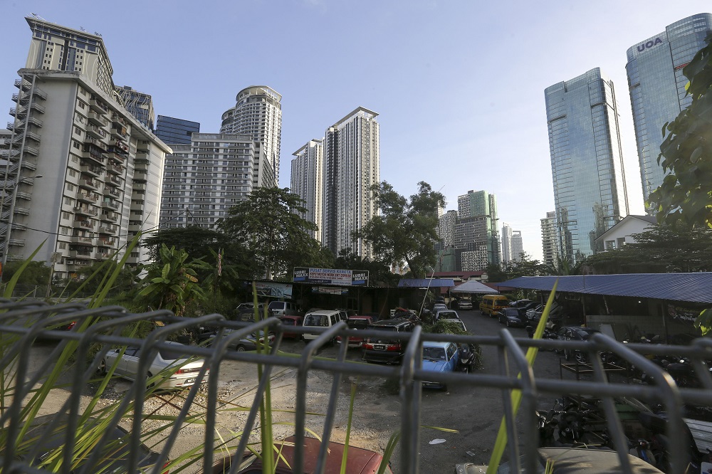 Fahmi has been hard at work trying to restore the area’s name back to Kampung Kerinchi ― a pledge he first made during his campaign trails. — Picture by Yusof Mat Isa