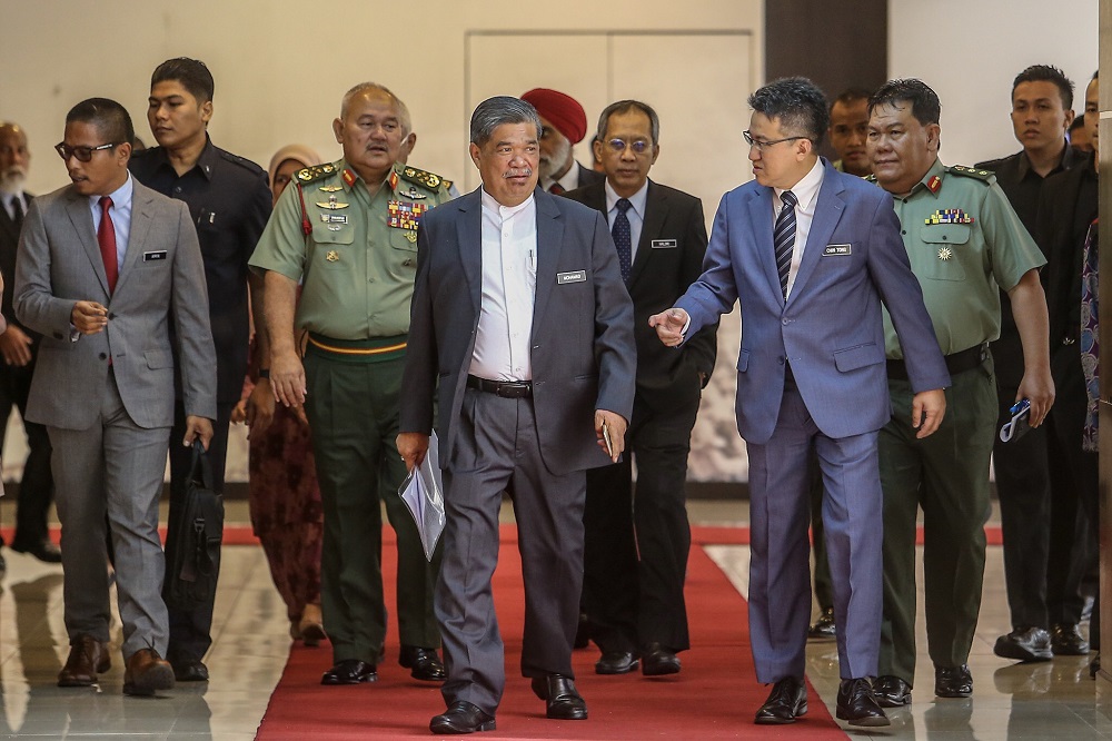 Defence Minister Mohamad Sabu (centre) arrives for the inaugural Perwira dialogue by the Ministry of Defence in Kuala Lumpur January 22, 2019. u00e2u20acu201d Picture by Hari Anggara