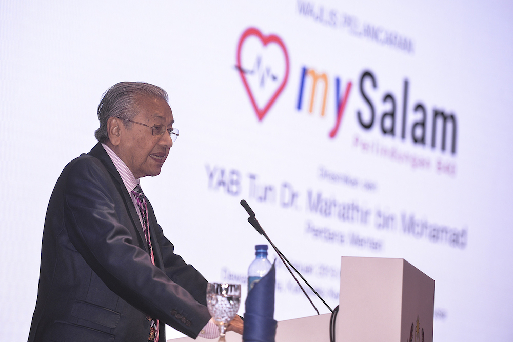 Tun Dr Mahathir Mohamad speaks at the launch of mySalam in Putrajaya January 24, 2019. u00e2u20acu201d Picture by Shafwan Zaidon