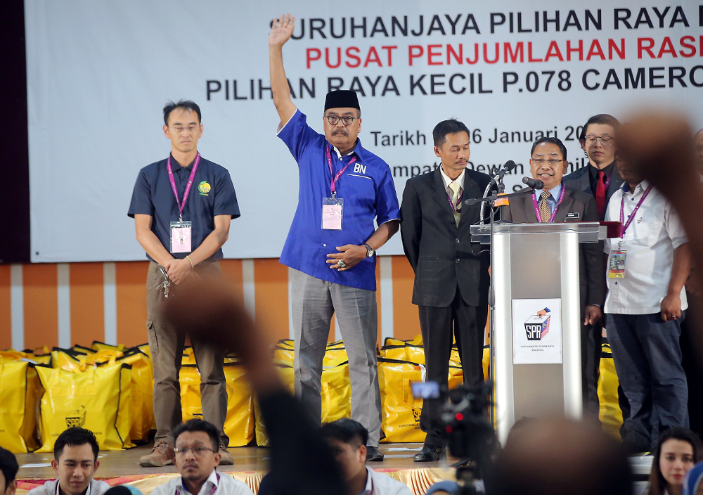 Barisan Nasional (BN) retained the Cameron Highlands parliamentary seat as Ramli Mohd Nor (centre) wins the by-election with a 3,238-vote majority January 26, 2019. u00e2u20acu201d Picture by Farhan Najib