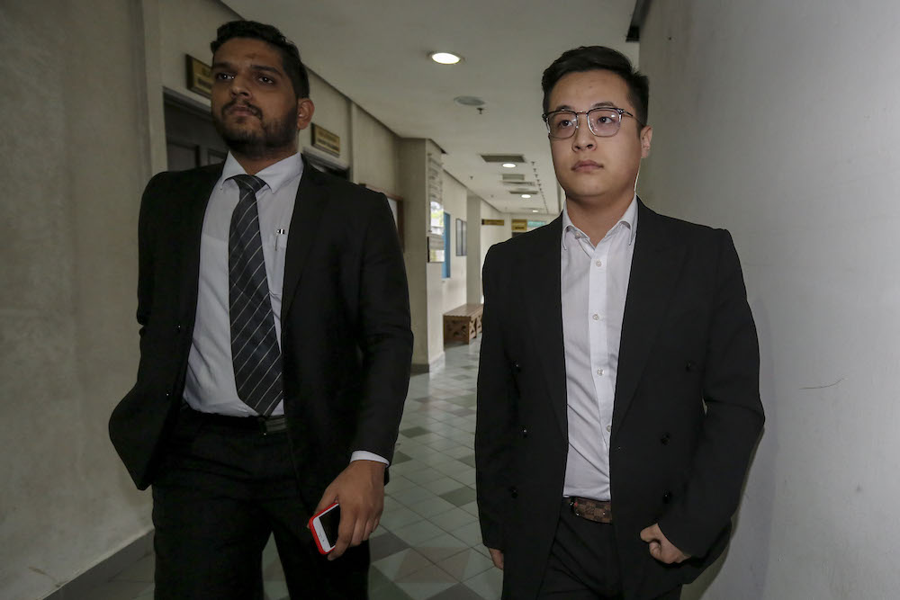 Altantuya Shaariibuuu00e2u20acu2122s son, Mungunshagi Bayarjargal (right), is pictured at Shah Alam High Court January 30, 2019. u00e2u20acu201d Picture by Yusof Mat Isa