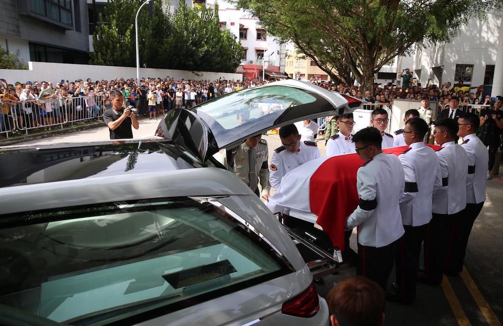Aloysius Pang's coffin being carried into the hearse before it left for a military funeral at the Mandai Crematorium on January 27, 2019. u00e2u20acu201d TODAY pic
