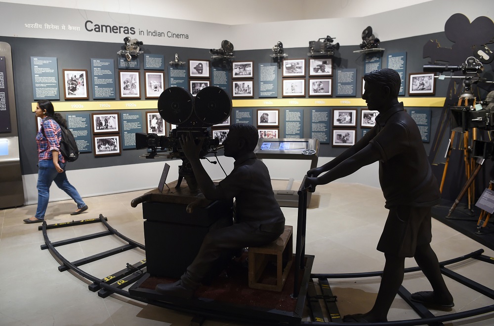 In this picture taken on January 22, 2019, an Indian student (right) visits the National Museum of Indian Cinema (NMIC), the country’s first museum showcasing the history of its film industry, in Mumbai. — AFP pic 