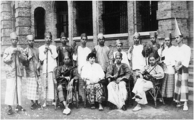 A 'boria' party in 1920. — Picture courtesy of the Penang State Museum