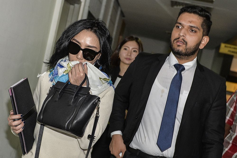 Burmaa Oyunchimeg (left), first cousin of Altantuya Shaariibuu, arrives at the Shah Alam High Court January 24, 2019. u00e2u20acu201d Picture by Miera Zulyana