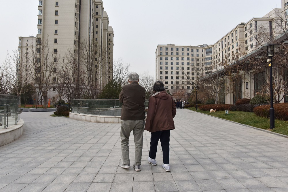 This photo taken on December 5, 2018, shows residents walking to their apartment at the Yanyuan community for senior citizens, on the outskirts of Beijing. u00e2u20acu201d AFP pic     