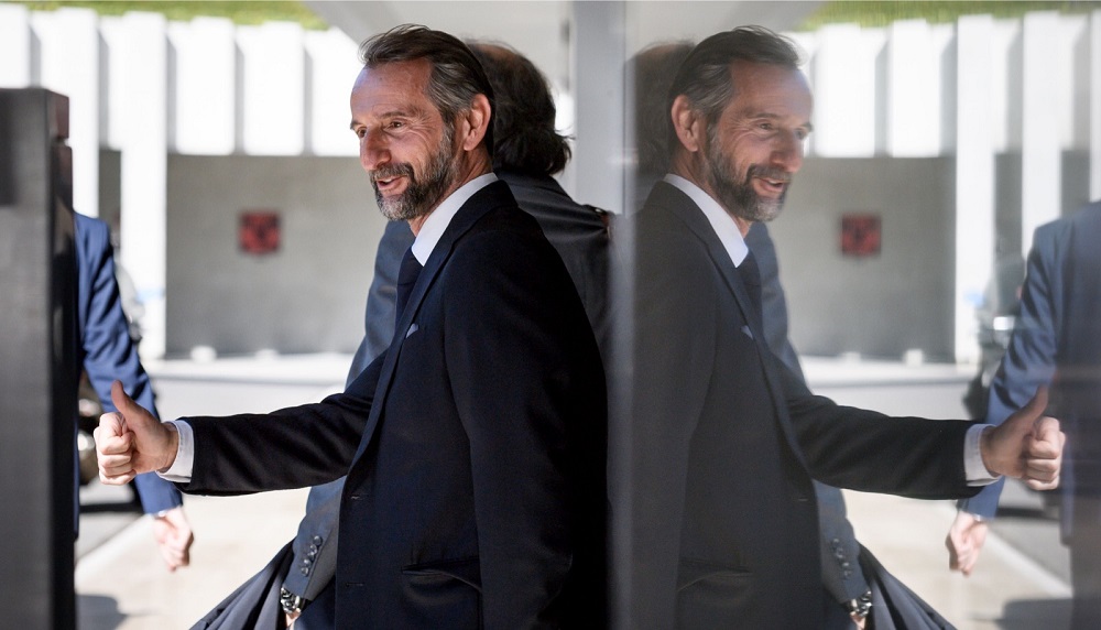 Paris Saint-Germain's assistant general manager Jean-Claude Blanc gives a thumb up after a hearing on Uefa Financial Fair Play Regulations at the House of European Football in Nyon April 20, 2018. u00e2u20acu201d AFP pic