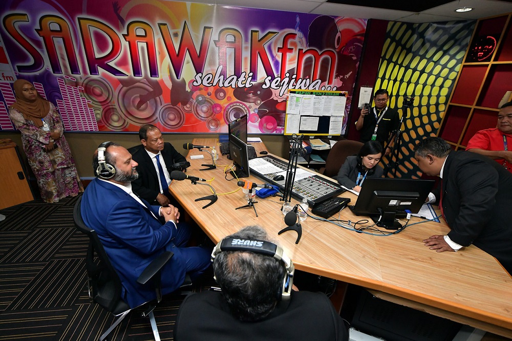 Communications and Multimedia Minister Gobind Singh Deo (left) during an interview at the SARAWAKfm radio station in Kuching January 14, 2019. u00e2u20acu201d Bernama pic