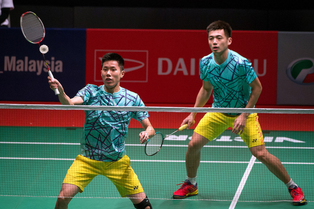 Goh V Shem and Tan Wee Kiong are seen in action against Indonesiau00e2u20acu2122s Mohammad Ahsan and Hendra Setiawan during the 2019 Malaysia Masters in Kuala Lumpur January 18, 2019. u00e2u20acu201d Bernama pic