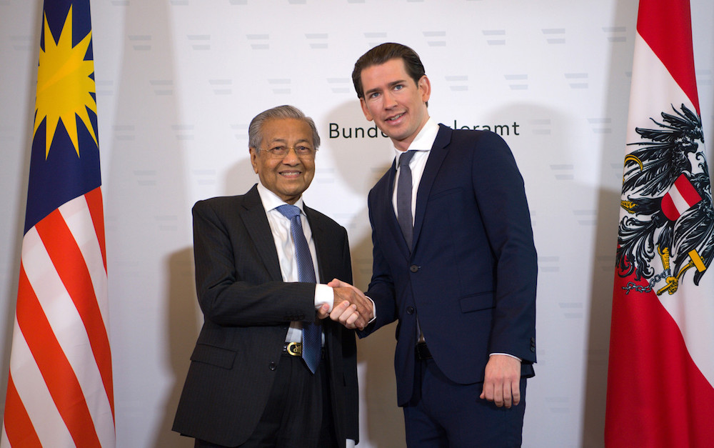 Tun Dr Mahathir Mohamad is greeted by Austrian Chancellor Sebastian Kurz at the Federal Chancellery in Vienna January 21, 2019. u00e2u20acu201d Bernama pic