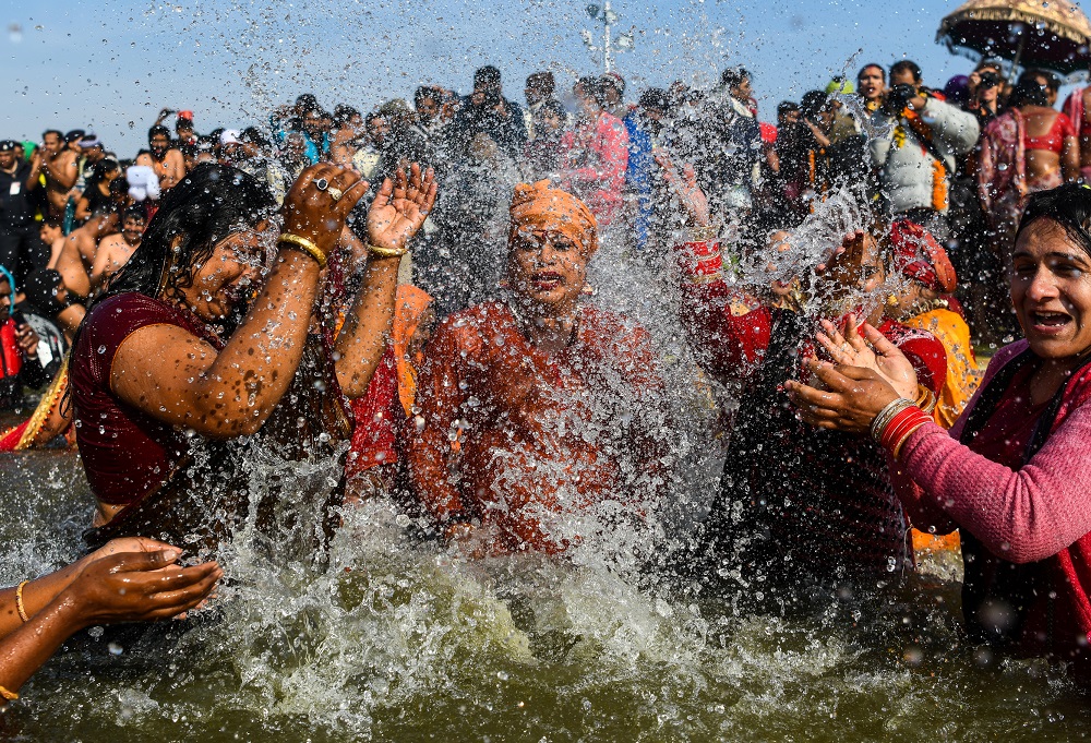 In this photograph taken on January 15, 2019, followers of the Kinnar Akhara monastic Hindu order made up of transgender members take a dip in the Sangam during the auspicious bathing day of Makar Sankranti at the Kumbh Mela in Allahabad. u00e2u20acu201d AFP pic