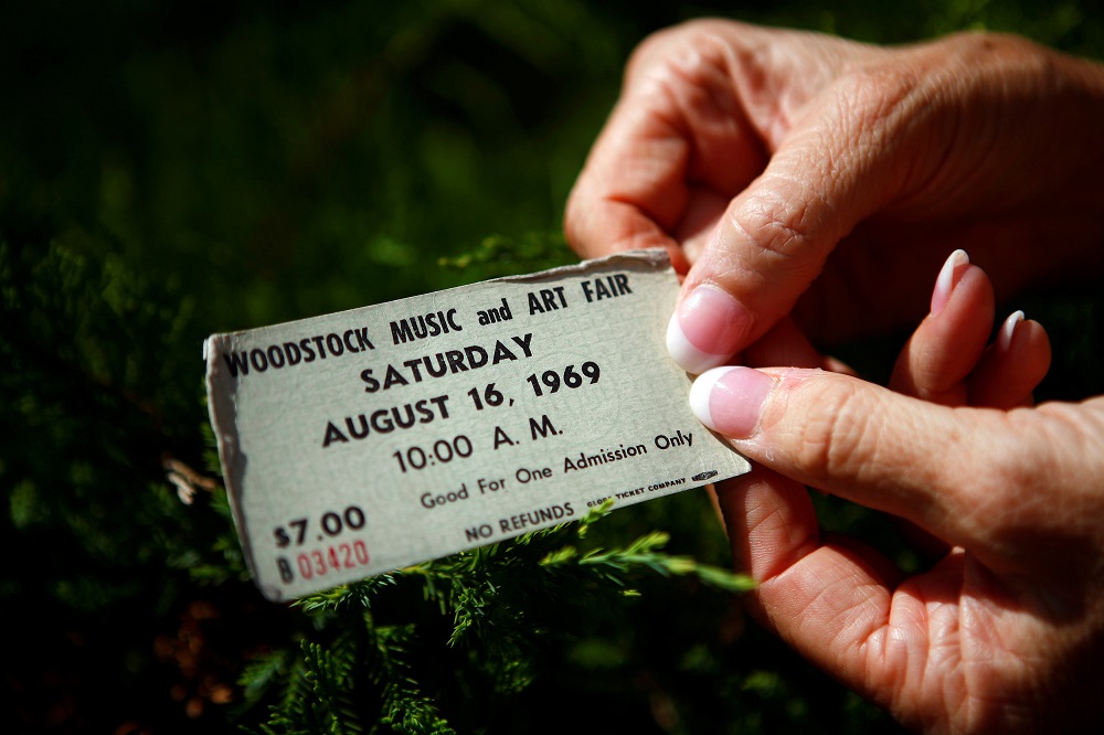 Janet Huey displays her original ticket at the site of the original Woodstock Music Festival in Bethel, New York August 14, 2009. u00e2u20acu201d Reuters pic     