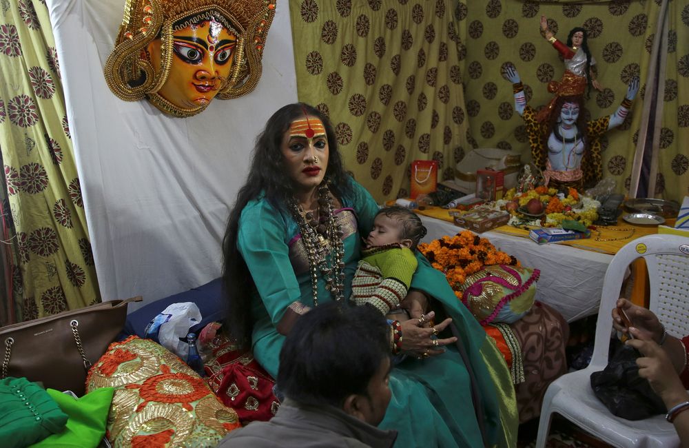 Laxmi Narayan Tripathi, chief of the u00e2u20acu02dcKinnar Akharau00e2u20acu2122 congregation for transgender people holds a baby of her follower during u00e2u20acu02dcKumbh Melau00e2u20acu2122 festival, in Prayagraj, previously known as Allahabad, India, January 15, 2019. u00e2u20acu201d Reuters pic