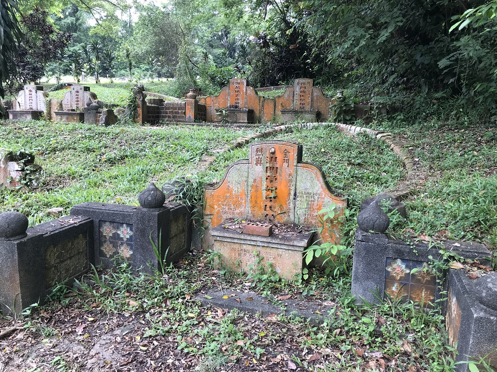 A file picture taken on November 30, 2018 shows graves with Chinese inscriptions at the Bukit Brown cemetery, one of the oldest cemeteries in Singapore, which is scheduled to be cleared for housing by 2030. u00e2u20acu201d Thomson Reuters Foundation pic
