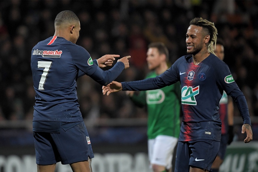 Paris Saint-Germain's Kylian Mbappe (left) celebrates with teammate Neymar Jr after scoring a goal during the French Cup football match against GSI Pontivy at the Moustoir stadium January 6, 2019. u00e2u20acu201d AFP pic