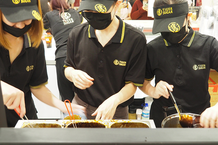 Your drink goes through a multi-step process from coating the cup with syrup, adding pearls, cold milk and a topping of cream mousse