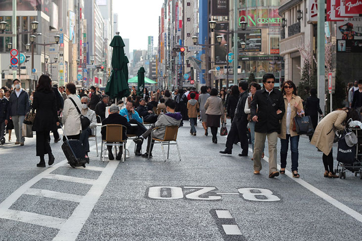 On weekend afternoons pedestrians roam freely along the central Chuo-dori