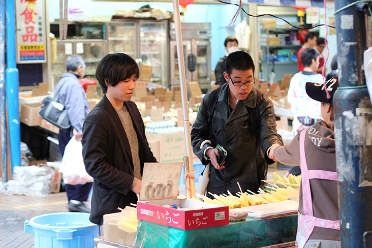 Explore the 'yatai' (street food stalls) at a market for a wide variety of Japanese foods