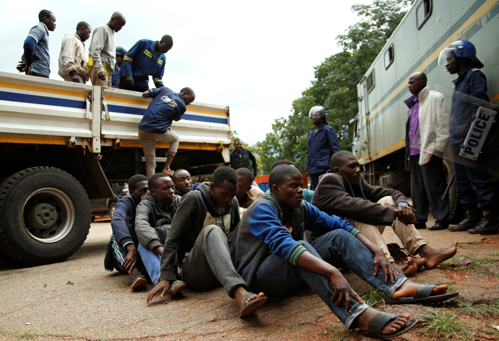 People arrested during protests wait to appear in the Magistrates court in Harare, Zimbabwe, January 16, 2019. u00e2u20acu201d Reuters pic 