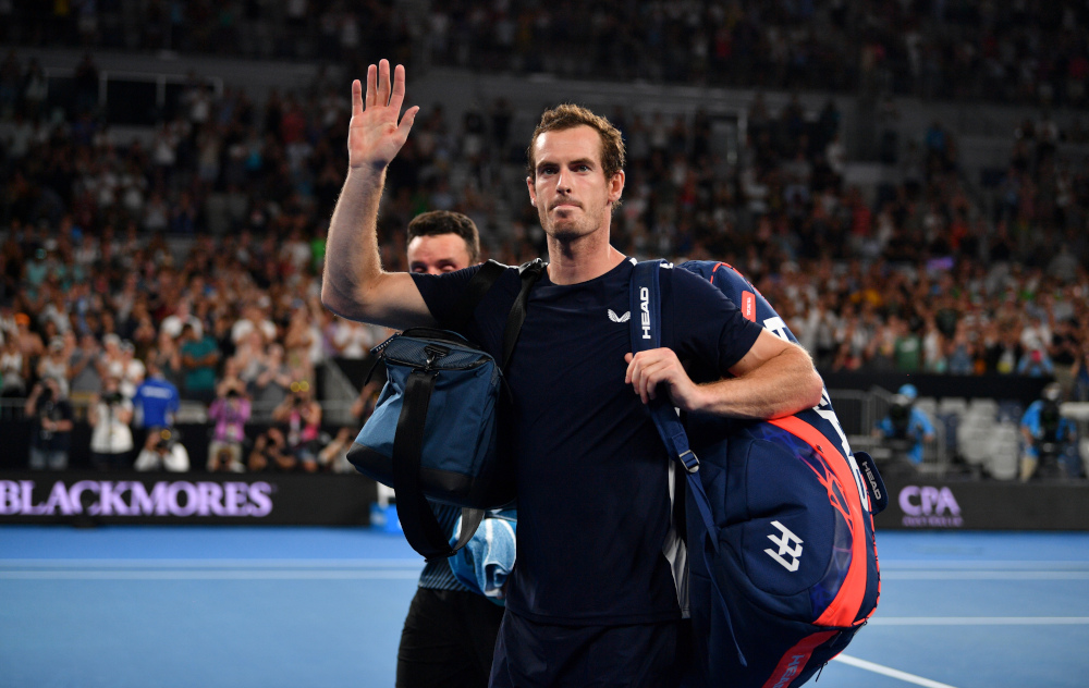Britainu00e2u20acu2122s Andy Murray waves to supporters after his defeat against Spainu00e2u20acu2122s Roberto Bautista Agut during their menu00e2u20acu2122s singles match on day one of the Australian Open tennis tournament in Melbourne on January 14, 2019. u00e2u20acu201d AFP pic