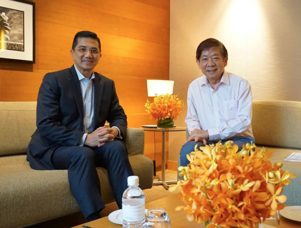 Minister of Economic Affairs Datuk Seri Mohamed Azmin Ali and Singapore Transport Minister Khaw Boon Wan pose for pictures before their meeting in Singapore January 14, 2019. u00e2u20acu201d Picture via Twitter/AzminAli
