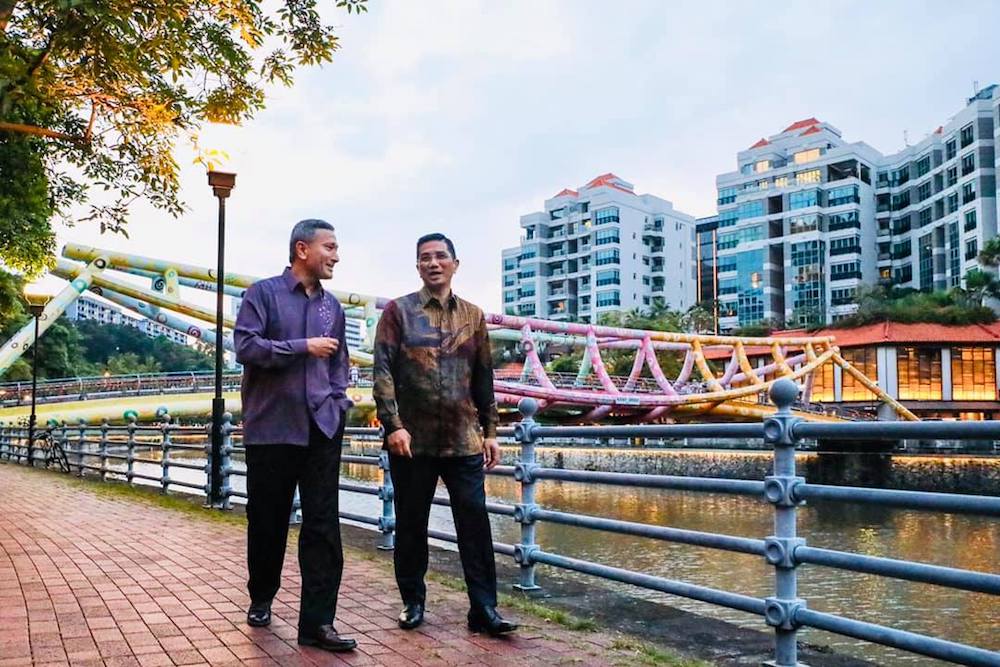 Singapore Foreign Affairs Minister Dr Vivian Balakrishnan shared this photo of himself taking a stroll along the Singapore River with Malaysian Minister of Economic Affairs Datuk Seri Azmin Ali yesterday. u00e2u20acu201d Picture via Facebook/Vivian.Balakrishnan